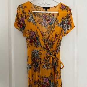 Revamped yellow floral wrap dress romper